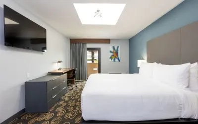 King room with TV at Regency Miami Airport By Sonesta.