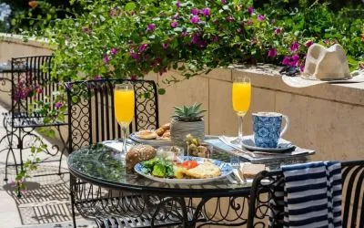 Breakfast available on outdoor terrace at Prima Royale Hotel.