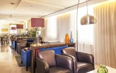 Lobby and lounge seating at Prima Royale Hotel.