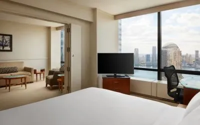Comfortable day use room with TV and lounge at Millennium Downtown New York.
