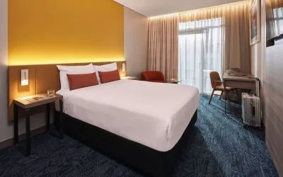 Romantic king room at Rydges Sydney Airport Hotel.