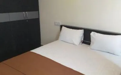 Simple king room at The Nisarga Grand.