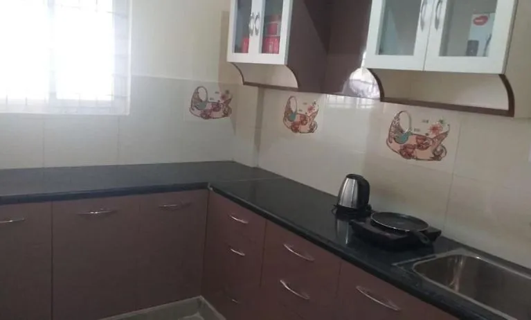 Kitchen and coffee maker at The Nisarga Grand.