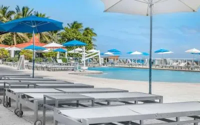 Sun loungers and umbrellas at Ramada Plaza Marco Polo Beach Resort.