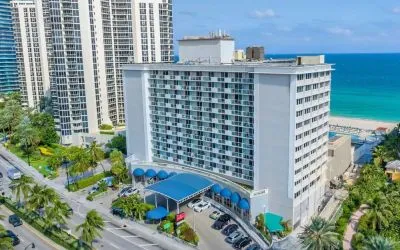 Hotel exterior and city view at Ramada Plaza Marco Polo Beach Resort.