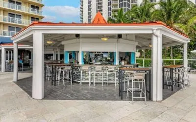 Hotel bar and coworking space at Ramada Plaza Marco Polo Beach Resort.