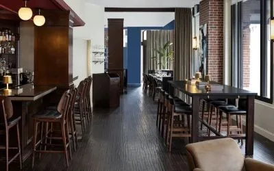 Dining area and bar at The Boxer Boston.