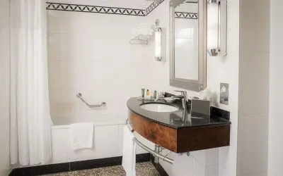 Guest bathroom with shower at Hilton London Paddington.