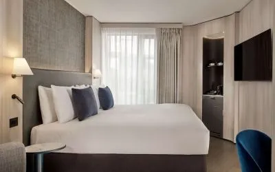 Elegant day room with natural light at The Westminster London, Curio Collection By Hilton.  