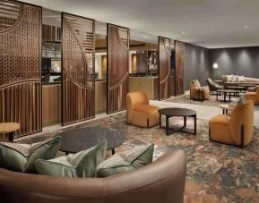 Lobby and coworking lounge at Hilton London Metropole. 
