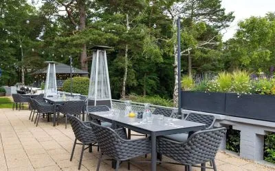 Outdoor dining area at Hilton Cobham.