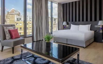 Spacious king suite with city views at DoubleTree by Hilton London Greenwich.