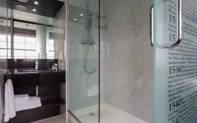 Guest bathroom with shower at DoubleTree by Hilton London Greenwich.