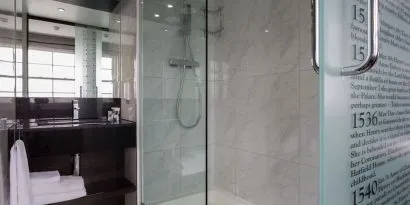 Guest bathroom with shower at DoubleTree by Hilton London Greenwich.