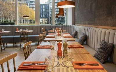 Spacious dining area perfect for coworking at Lincoln Plaza London, Curio Collection By Hilton.