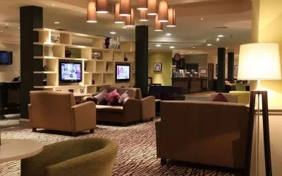 Lobby and coworking lounge at Doubletree by Hilton Glasgow Strathclyde.