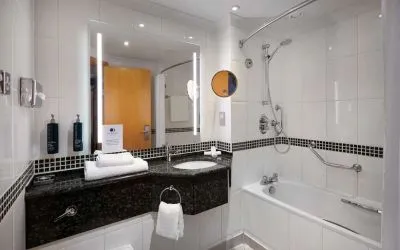 Guest bathroom with shower at DoubleTree by Hilton Swindon.