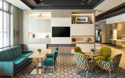 Lobby and coworking lounge at Leonardo Hotel Belfast.
