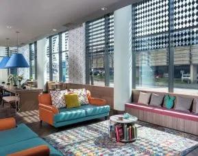 Lobby and coworking lounge at Leonardo Hotel Brighton.