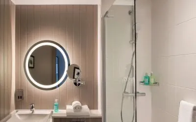 Guest bathroom with shower at Leonardo Royal Hotel Edinburgh.