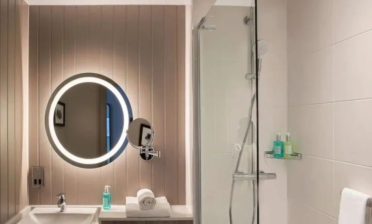 Guest bathroom with shower at Leonardo Royal Hotel Edinburgh.