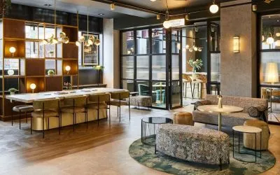 Lobby and coworking lounge at Leonardo Royal Hotel Glasgow.