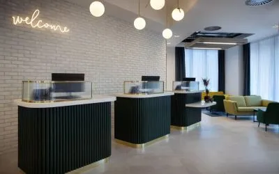 Lobby and coworking lounge at Leonardo Hotel Bristol City.
