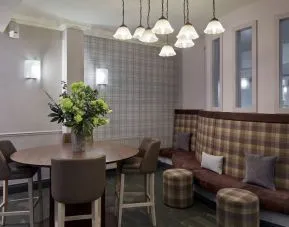 Lobby and coworking lounge at Leonardo Hotel Edinburgh City.