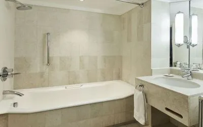 Guest bathroom with shower and at The Dilly.  