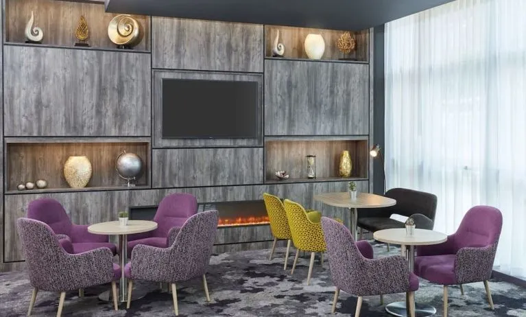 Lobby and coworking lounge at Leonardo Hotel Sheffield.