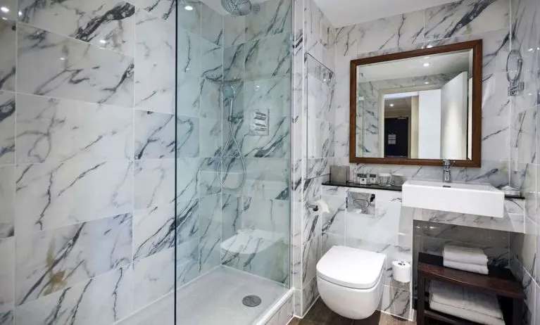 Guest bathroom with shower at DoubleTree By Hilton London Excel.
