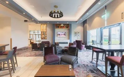 Lobby and coworking lounge at Hilton Garden Inn Birmingham Airport.
