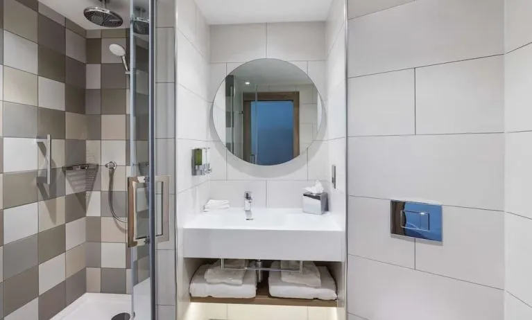 Guest bathroom with shower at Hampton By Hilton Torquay.