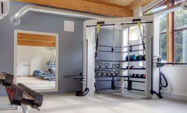 Fitness center with treadmills, machines and equipment at Hilton London Watford.
