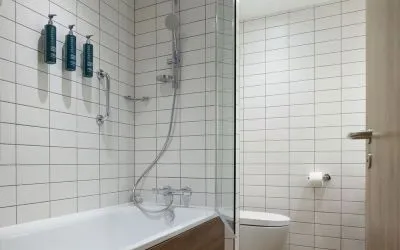 Guest bathroom with shower and tub at Hilton Garden Inn Stoke On Trent.