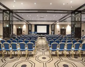 Spacious conference room for large crowds at the Hilton London Gatwick Airport.