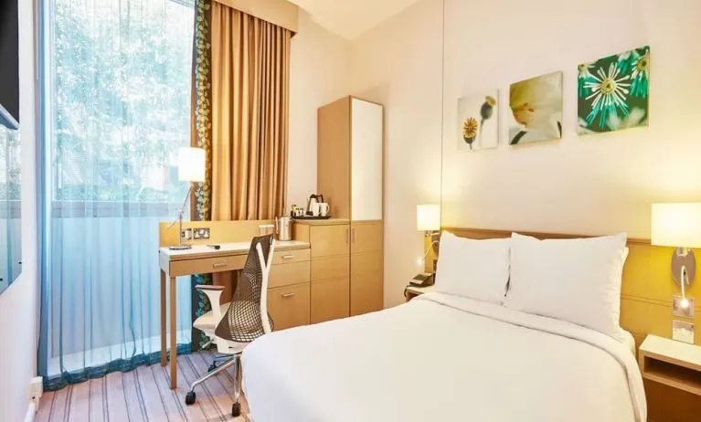 Bright day use room with work desk and TV at the Hilton Garden Inn Birmingham Brindleyplace.