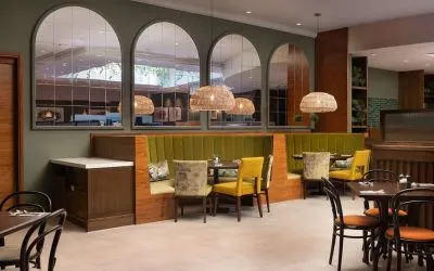Stylinsh dining area with comfortable mobiliary perfect for co-working at the Hilton Birmingham Metropole.
