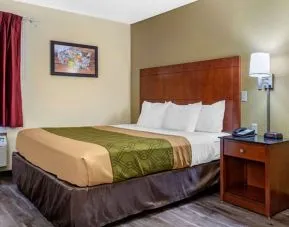 King room at Coratel Inn & Suites By Jasper River Falls.