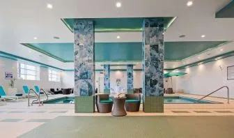 Relaxing indoor pool at Executive Residency By Best Western.