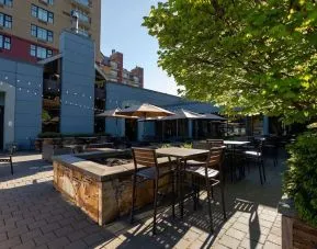 Outdoor bar with lounge area, perfect for co-working at Hilton Whistler Resort & Spa.