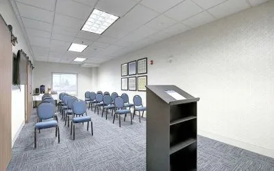 Professional meeting room at Holiday Inn Express & Suites Airport-Calgary.