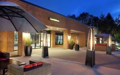 Outdoor seating at night at Boston Marriott Burlington.