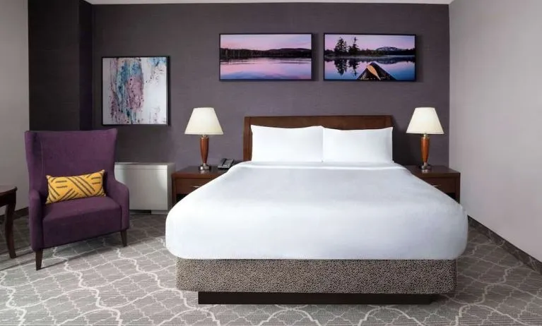 Standard day use room with queen bed, work desk and private bathroom at Hilton Garden Inn Calgary Airport.