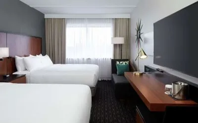 Day use Twin room with TV, work desk and private bathroom at DoubleTree By Hilton Montreal Airport.