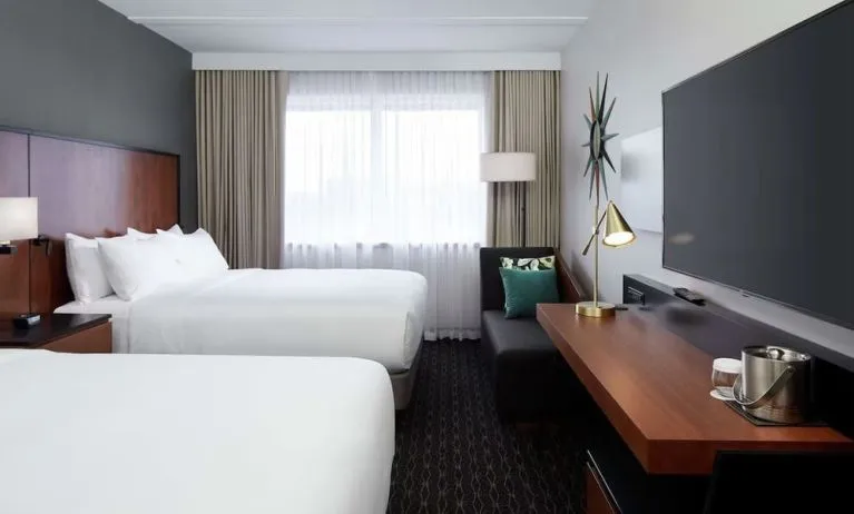 Day use Twin room with TV, work desk and private bathroom at DoubleTree By Hilton Montreal Airport.