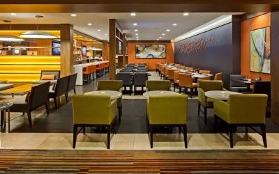 Dining area with comfortable seating at Hilton Mississauga Meadowvale.