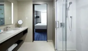 Private bathroom with shower at DoubleTree By Hilton Montreal.