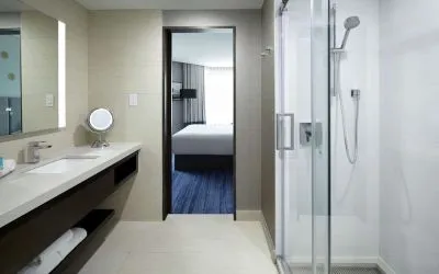 Private bathroom with shower at DoubleTree By Hilton Montreal.
