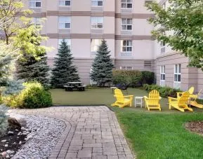 Hotel exterior patio at Homewood Suites By Hilton Toronto-Markham.